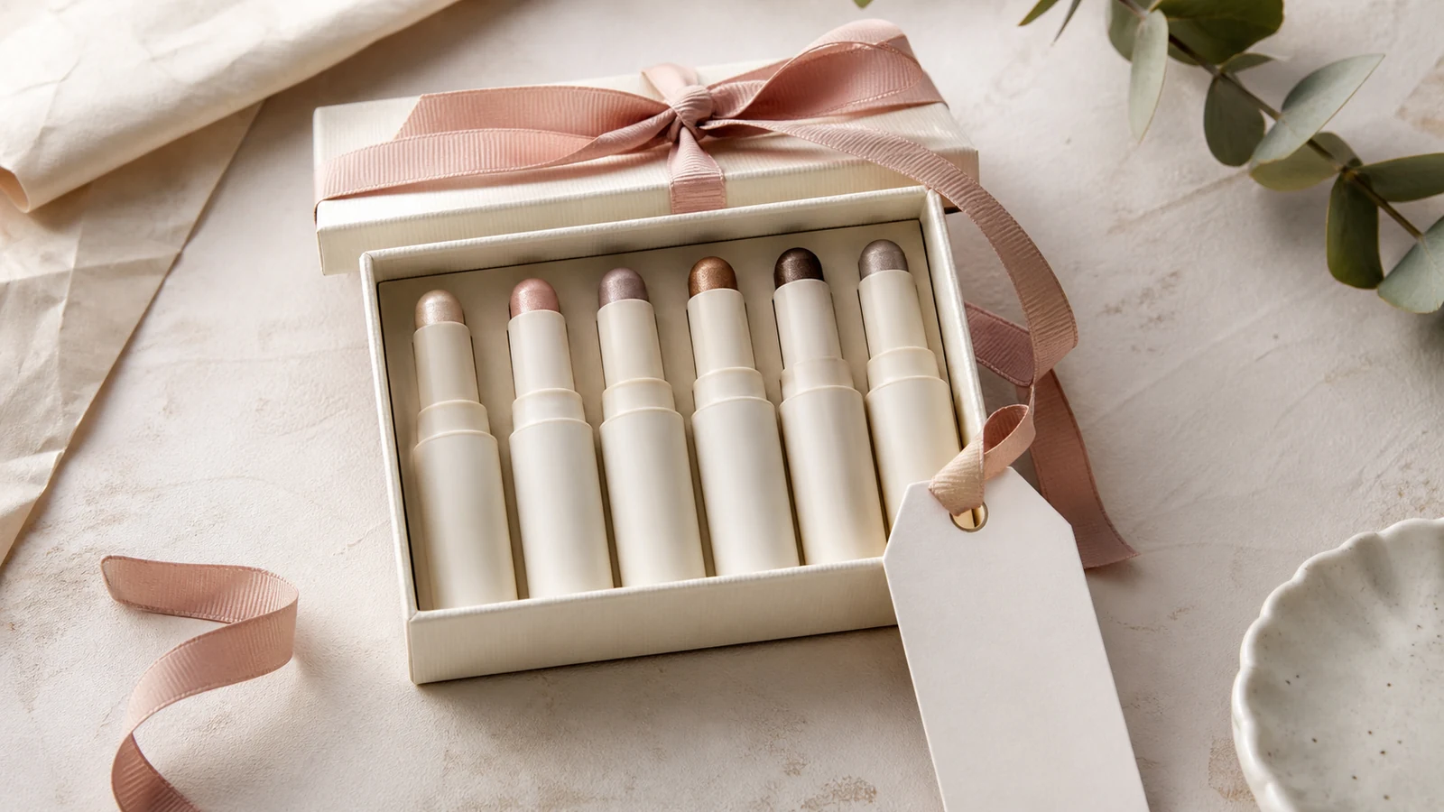Unbranded eyeshadow stick gift set arranged in a simple gift box.